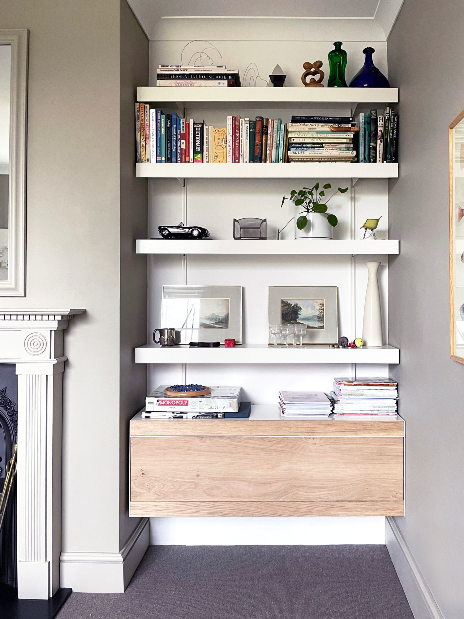 Modern alcove shelving with oak cabinet and white shelves above