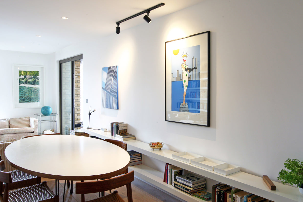 Low level wall mounted shelving as sideboard in living room