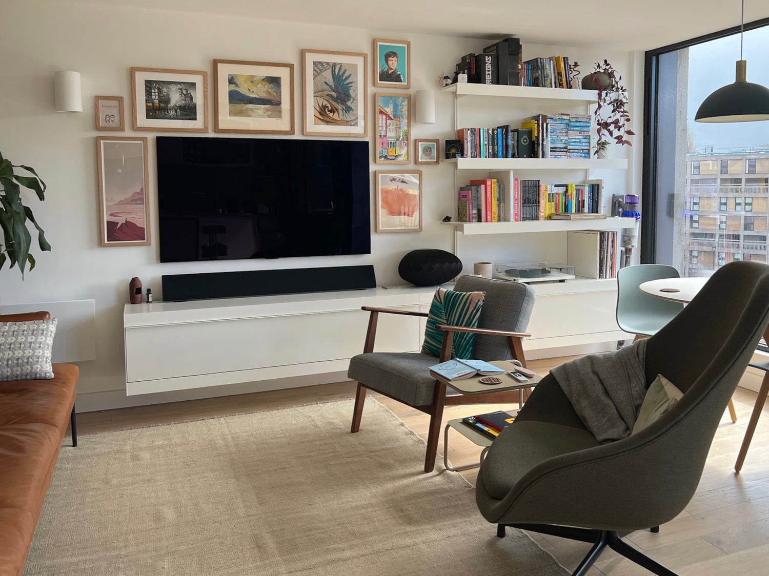 ON&ON wall mounted TV shelving system with cabinets in white