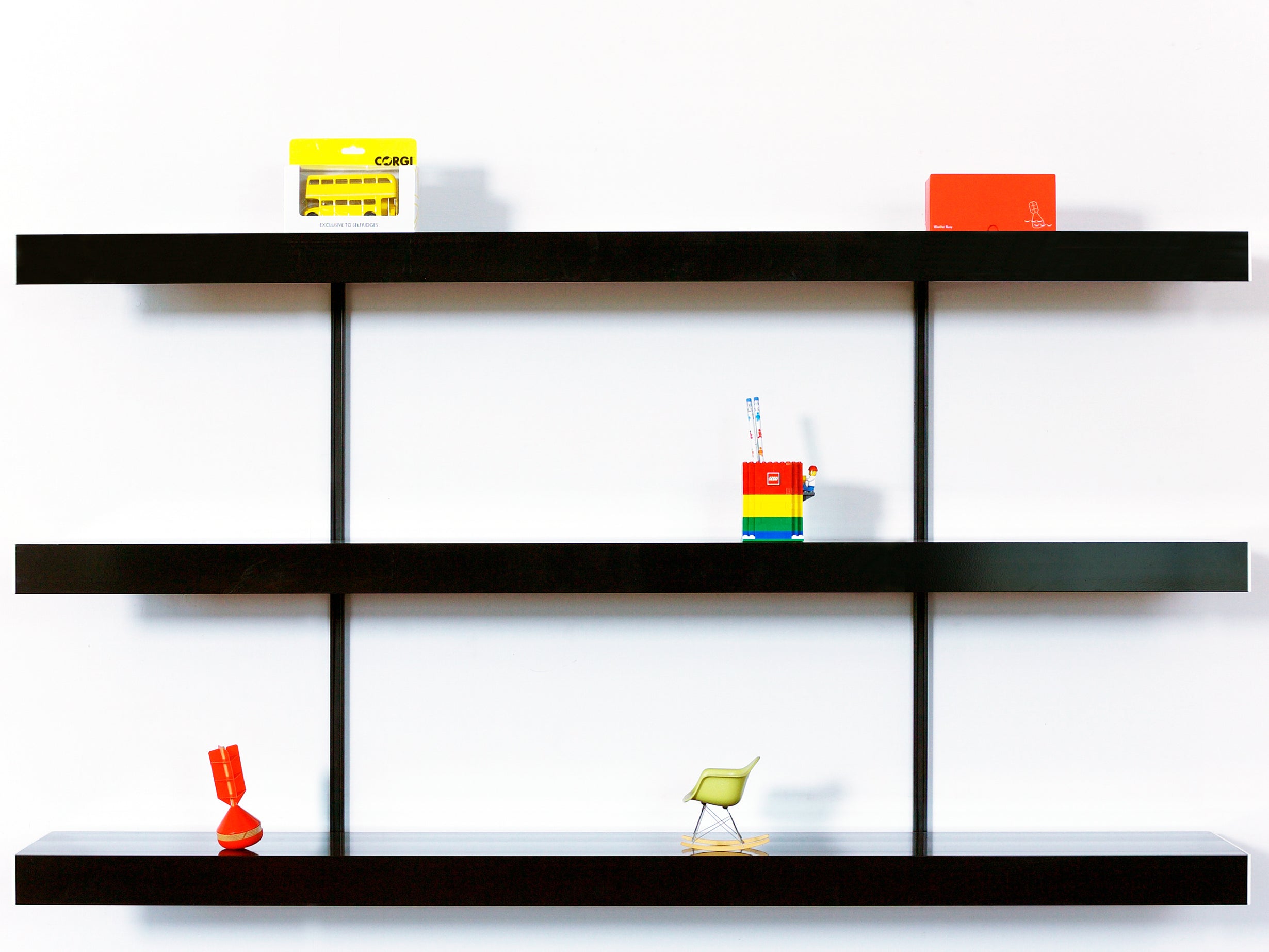 Modern black aluminium shelving system with 3 x black wall shelves