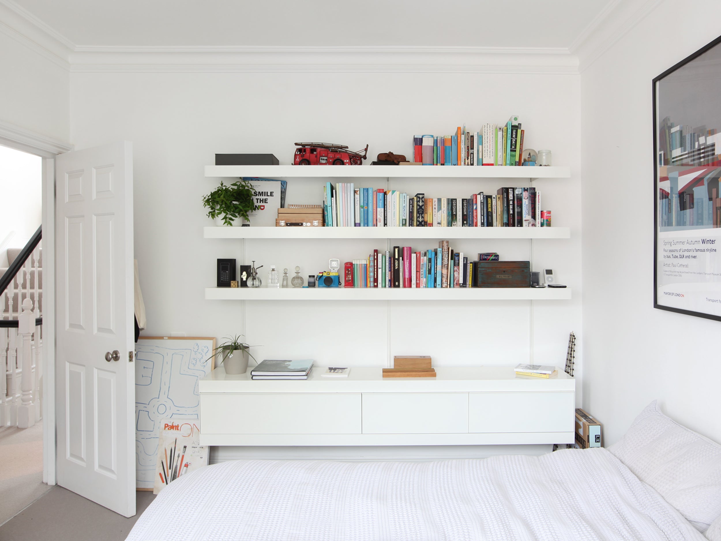Bedroom shelving system with drawers and shelves above