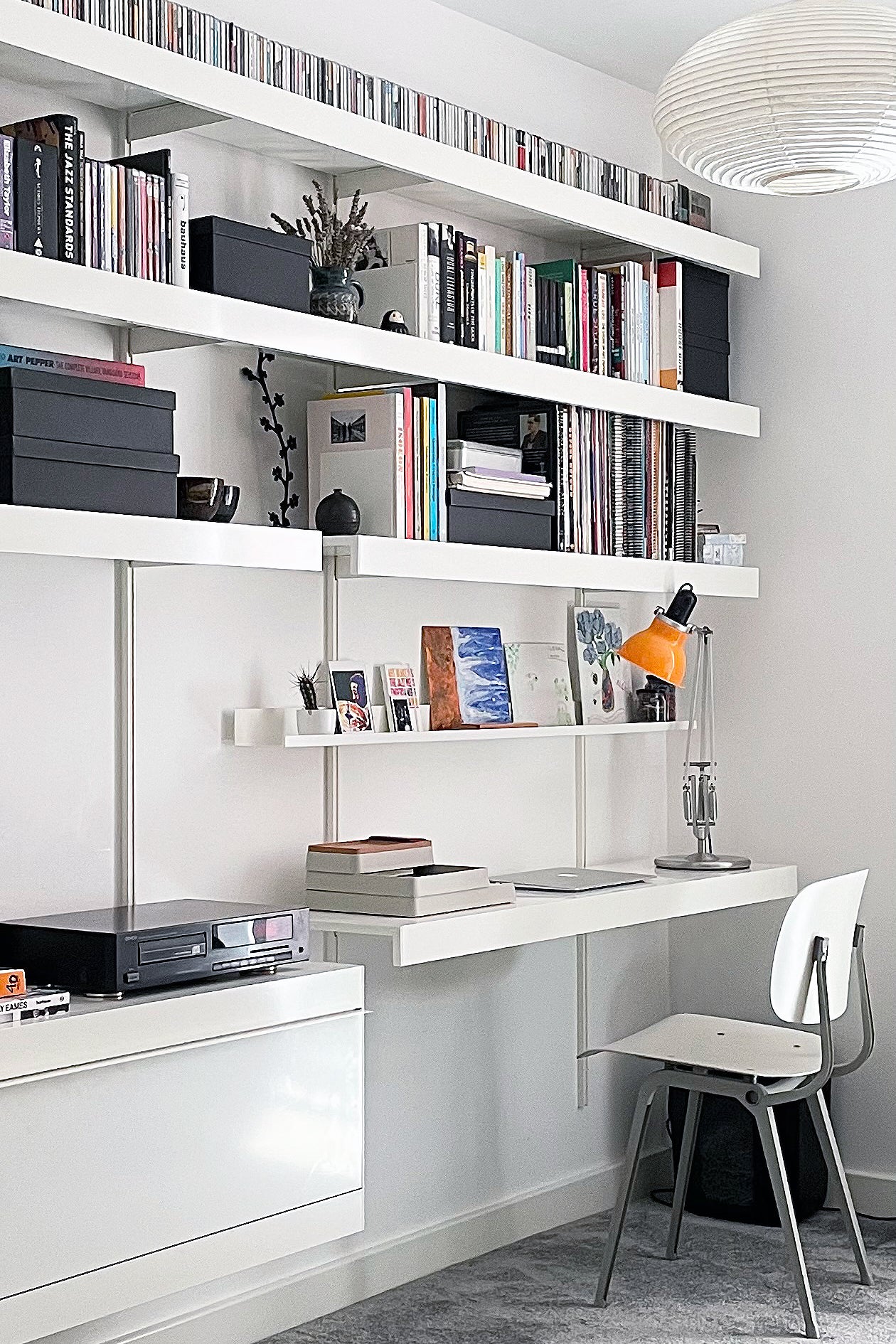 ON&ON home office design with desk, cabinets and wall shelving above