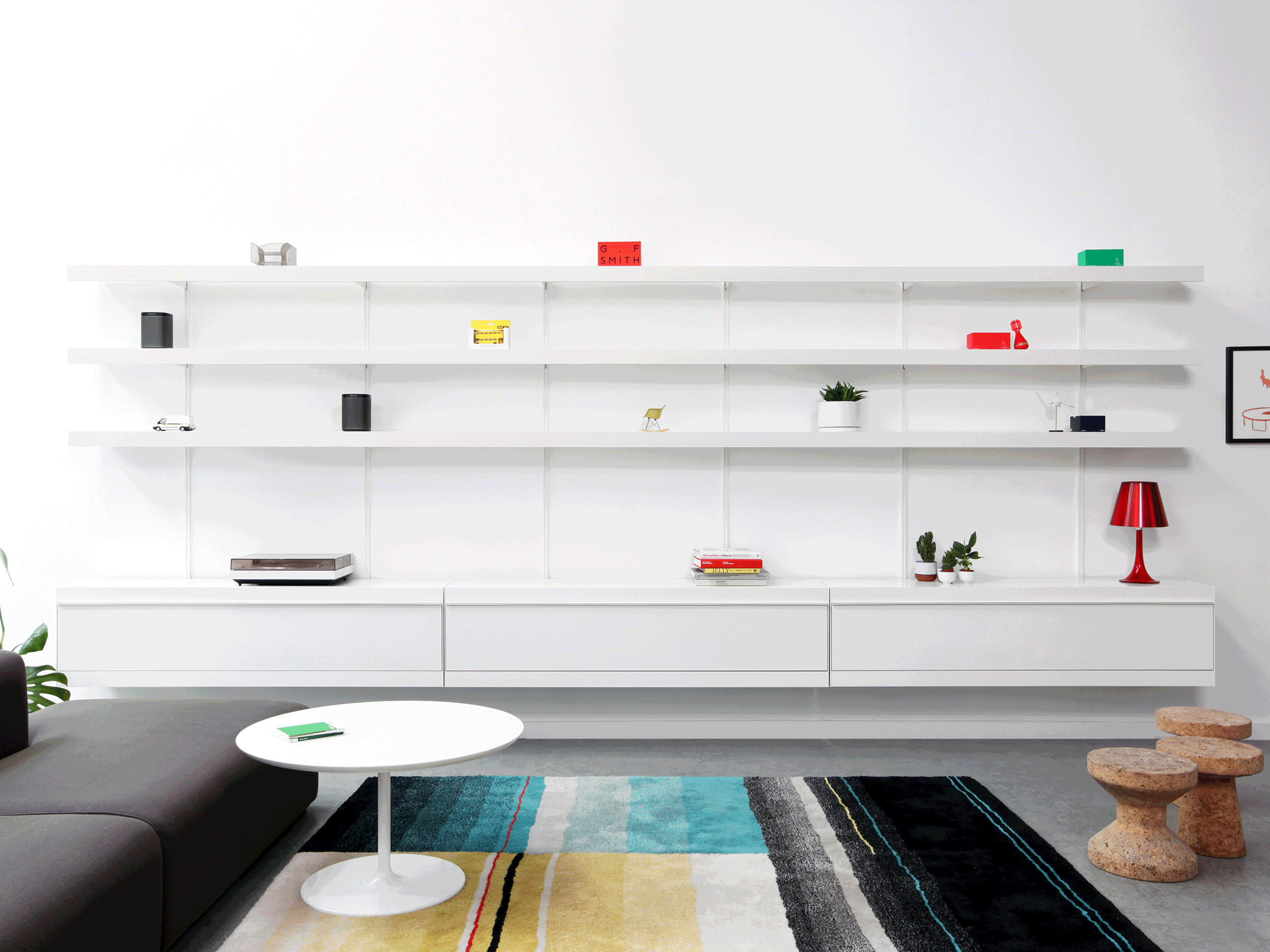 Modular shelving system with long white seamless shelves and cabinets by ON&ON shelving UK