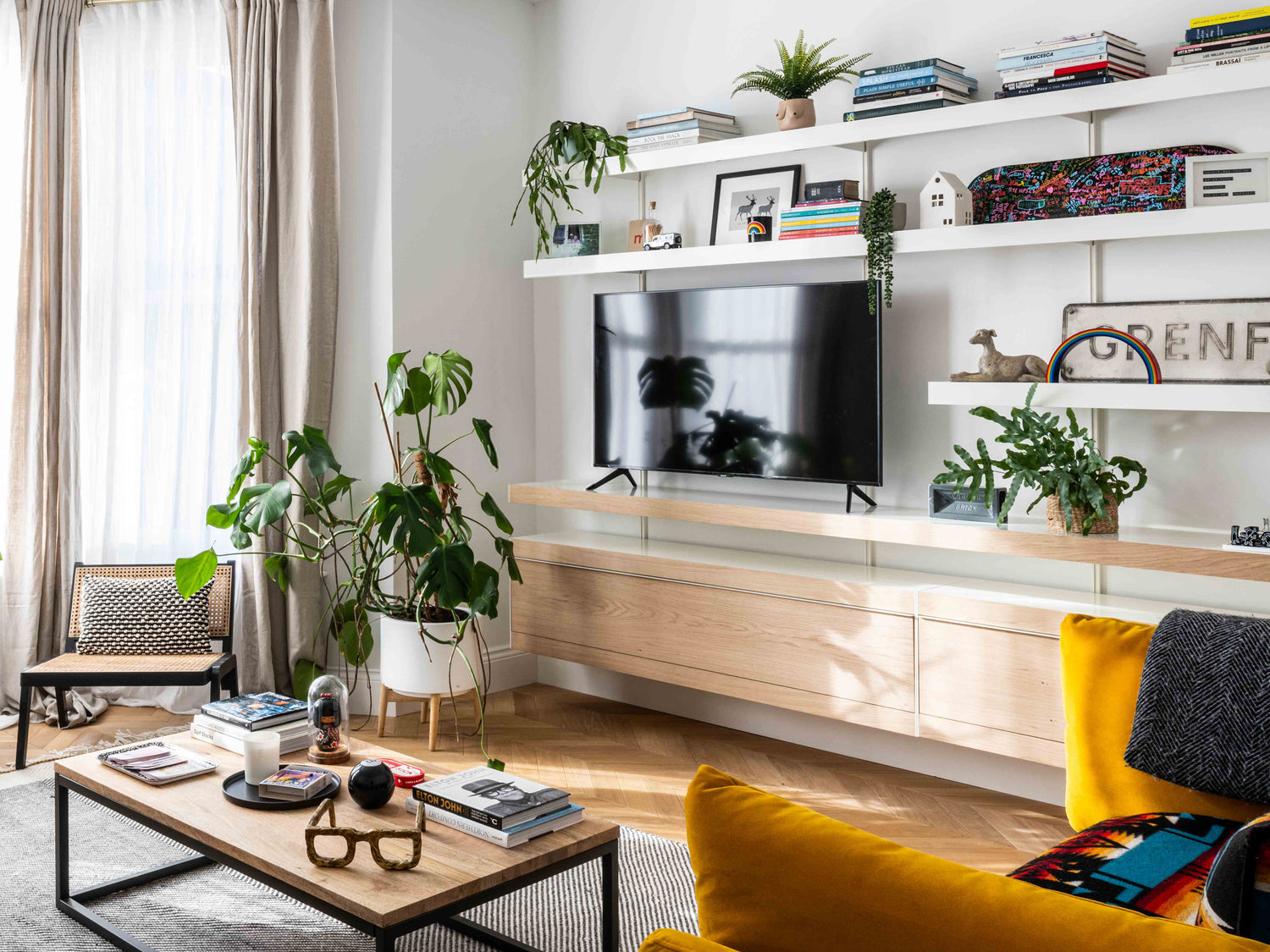 Living room shelving system designed as wall mounted TV unit