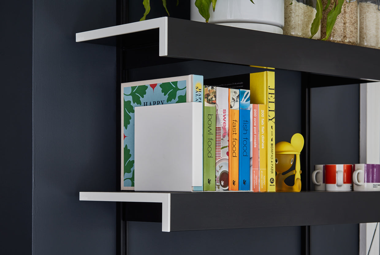 Black kitchen shelving with cookery books
