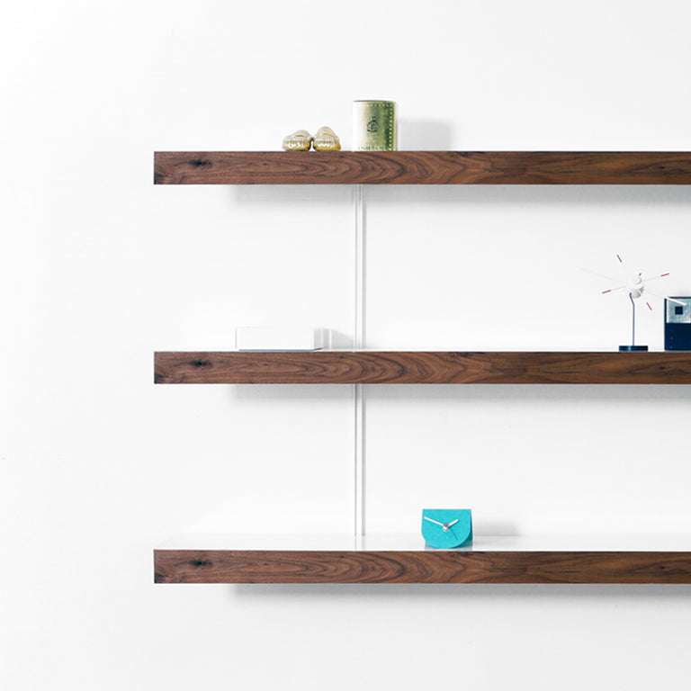 White shelving system with walnut fronts by ON&ON