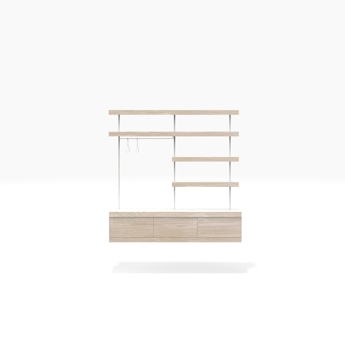 White wardrobe shelving system with oak fronts, floating drawers and clothes hangers