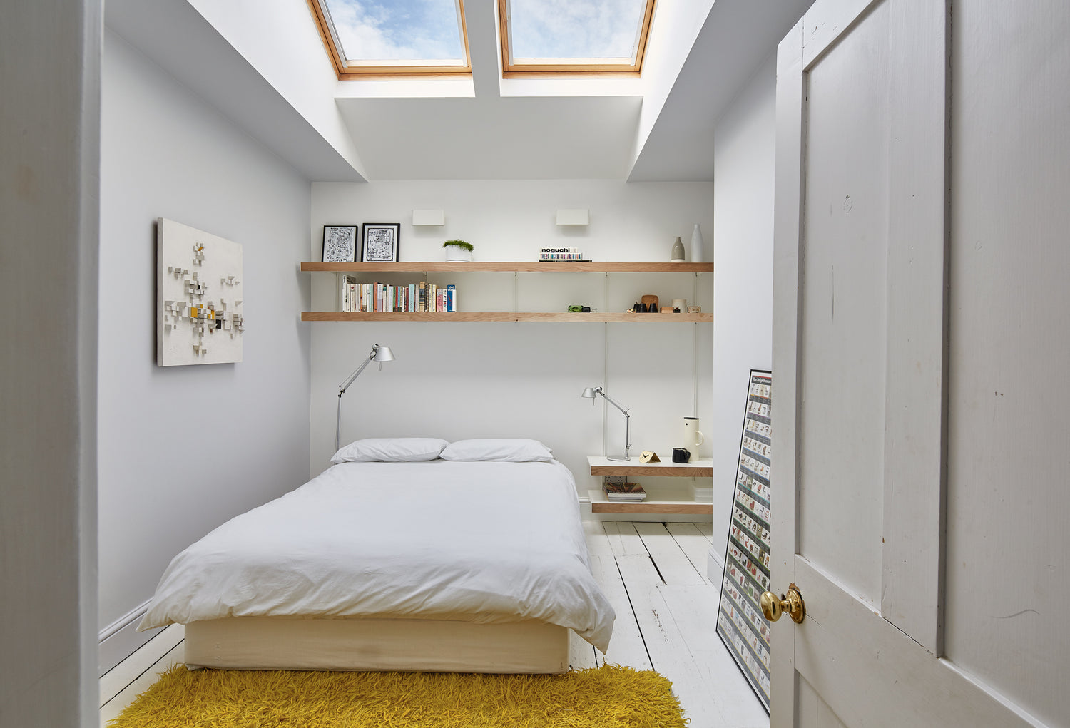 oak shelving system in white simple modern bedroom