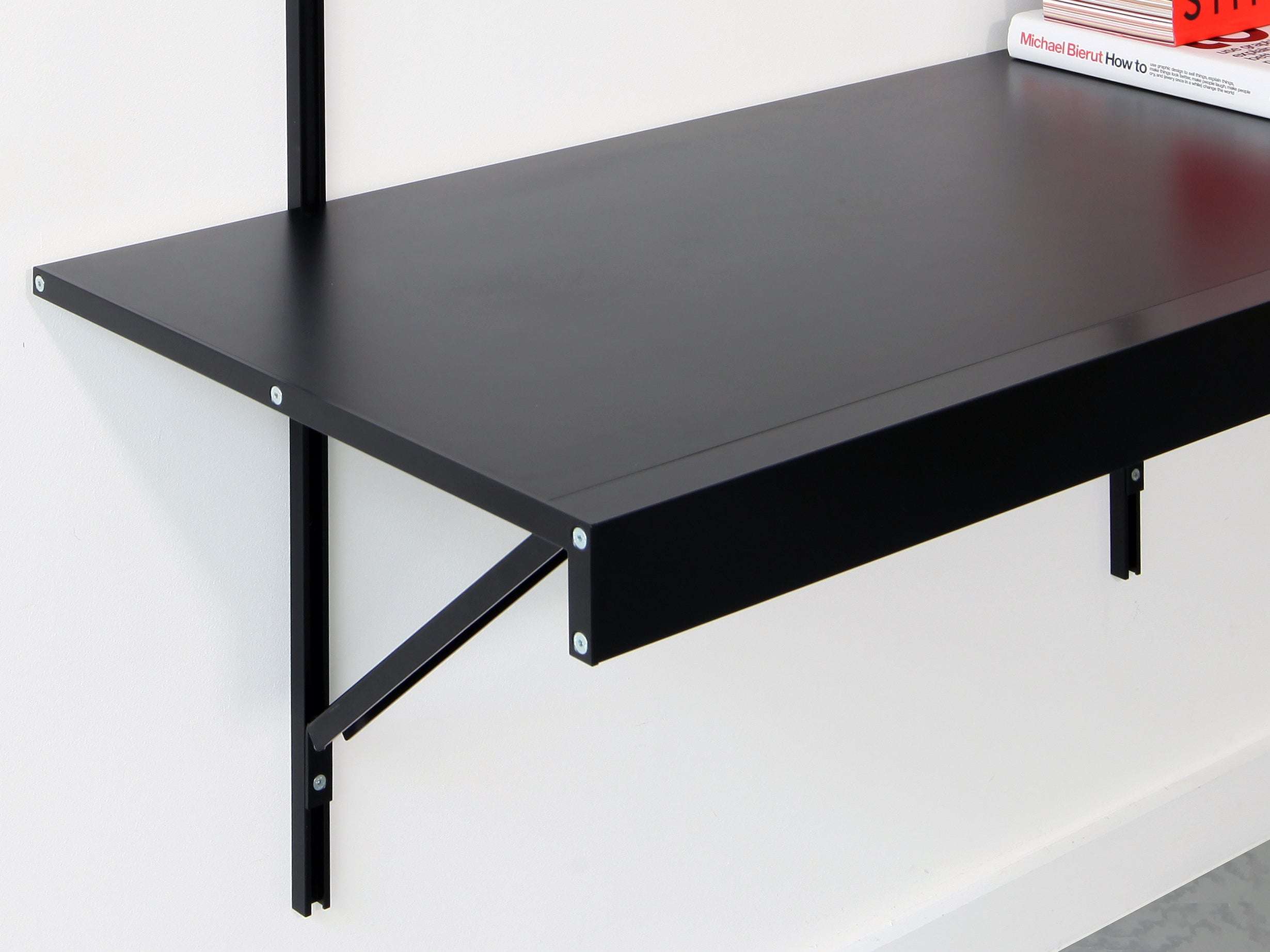 modular wall shelving with desk detail black