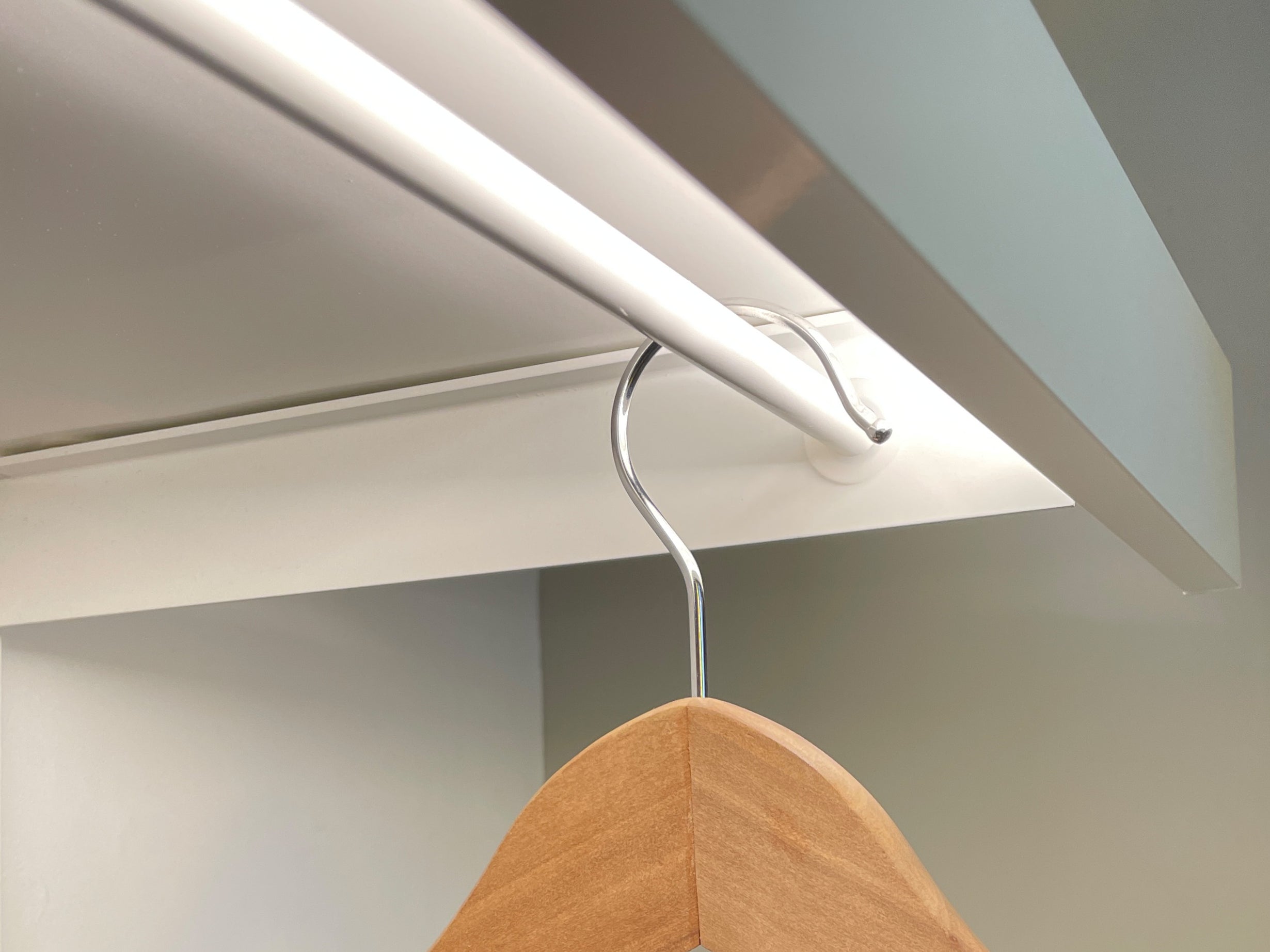modular shelving with clothes hangers